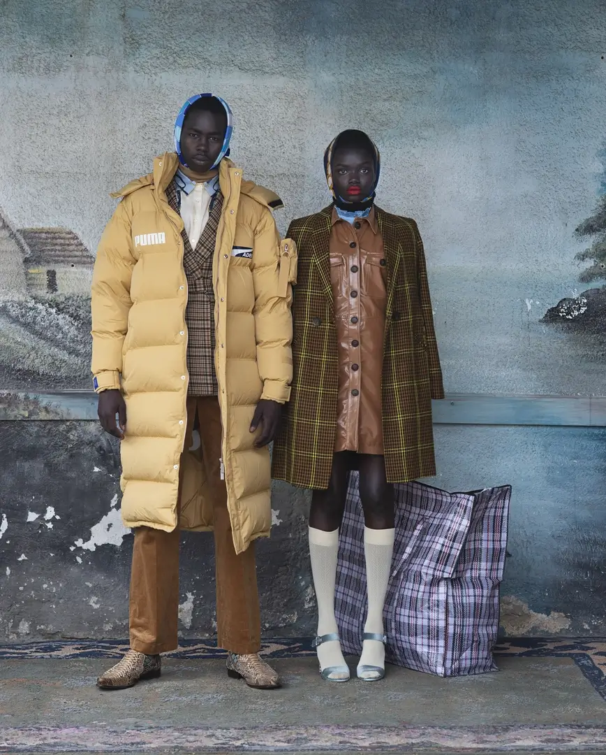 Dark skinned man and woman photographed by Miri Davidovitz